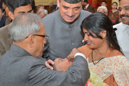 The President of India, Shri Pranab Mukherjee, launching the nationwide polio round by administering polio drops among the Children at Rashtrapati Bhavan in New Delhi on January 13, 2013. Also seen is the Union Minister of Health and Family Welfare, Shri