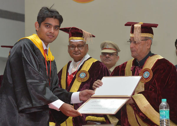 The President of India, Shri Pranab Mukherjee while presenting a degree to the student at the Second Convocation of the Indian Institute of Science Education and Research (IISER), Bhopal at Bhopal in Madhya Pradesh on June 27, 2014. Also seen is the Gove 