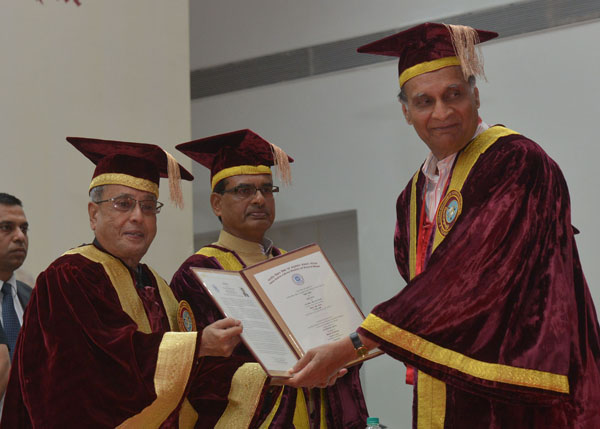 The President of India, Shri Pranab Mukherjee presenting D.Sc. (Honoris Causa) Degree to Prof. Goverdhan Mehta at the Second Convocation of the Indian Institute of Science Education and Research (IISER), Bhopal at Bhopal in Madhya Pradesh on June 27, 2014 