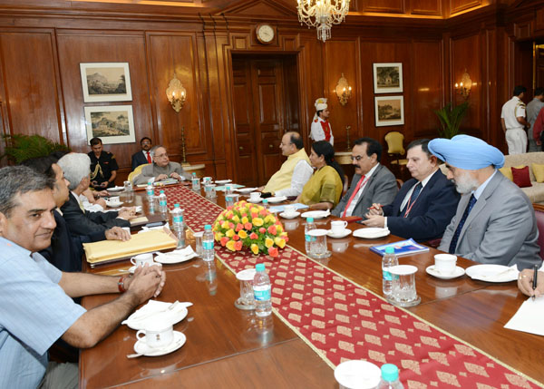 The President of India, Shri Pranab Mukherjee meeting with the Union Minister of Finance, Shri Arun Jaitley, the Union Minister of State for Finance, Smt Nirmala Sitaraman and other distinguished officer at Rashtrapati Bhavan in New Delhi on July 10, 2014 