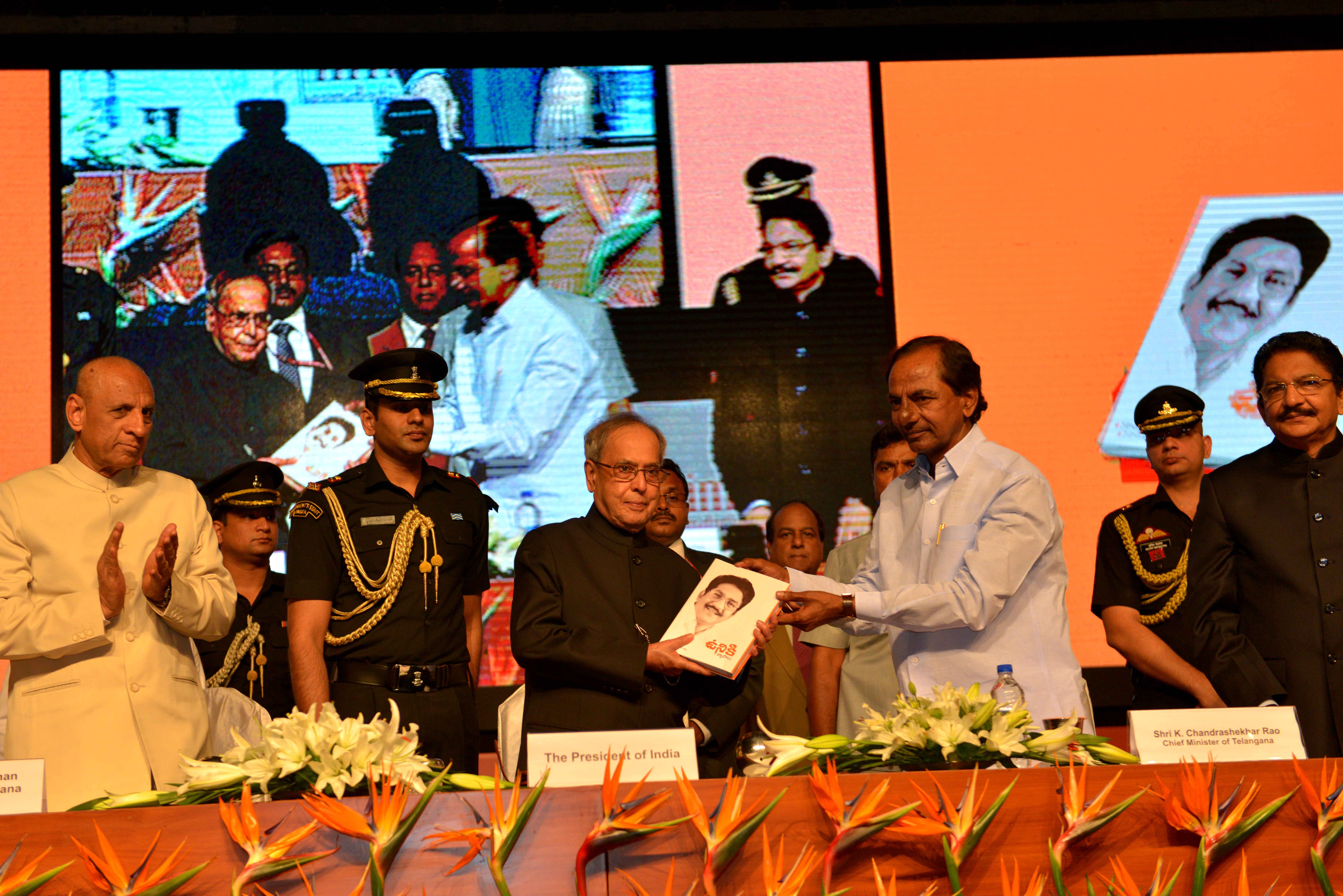 The President of India, Shri Pranab Mukherjee receiving the first copy of the book ‘Uniki’ written by Shri Ch Vidyasagar Rao, Governor of Maharashtra from Shri K Chandrashekar Rao, Chief Minister of Telangana in Hyderabad on July 3, 2015.