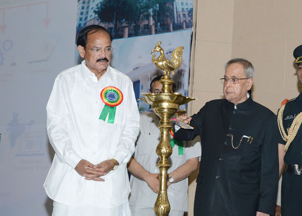 The President of India, Shri Pranab Mukherjee lighting the lamp at the 160th Annual Day Celebrations of Central Public Works Department (CPWD) at Vigyan Bhawan in New Delhi on July 12, 2014. Also seen is the Union Minister of Urban Development Housing an 