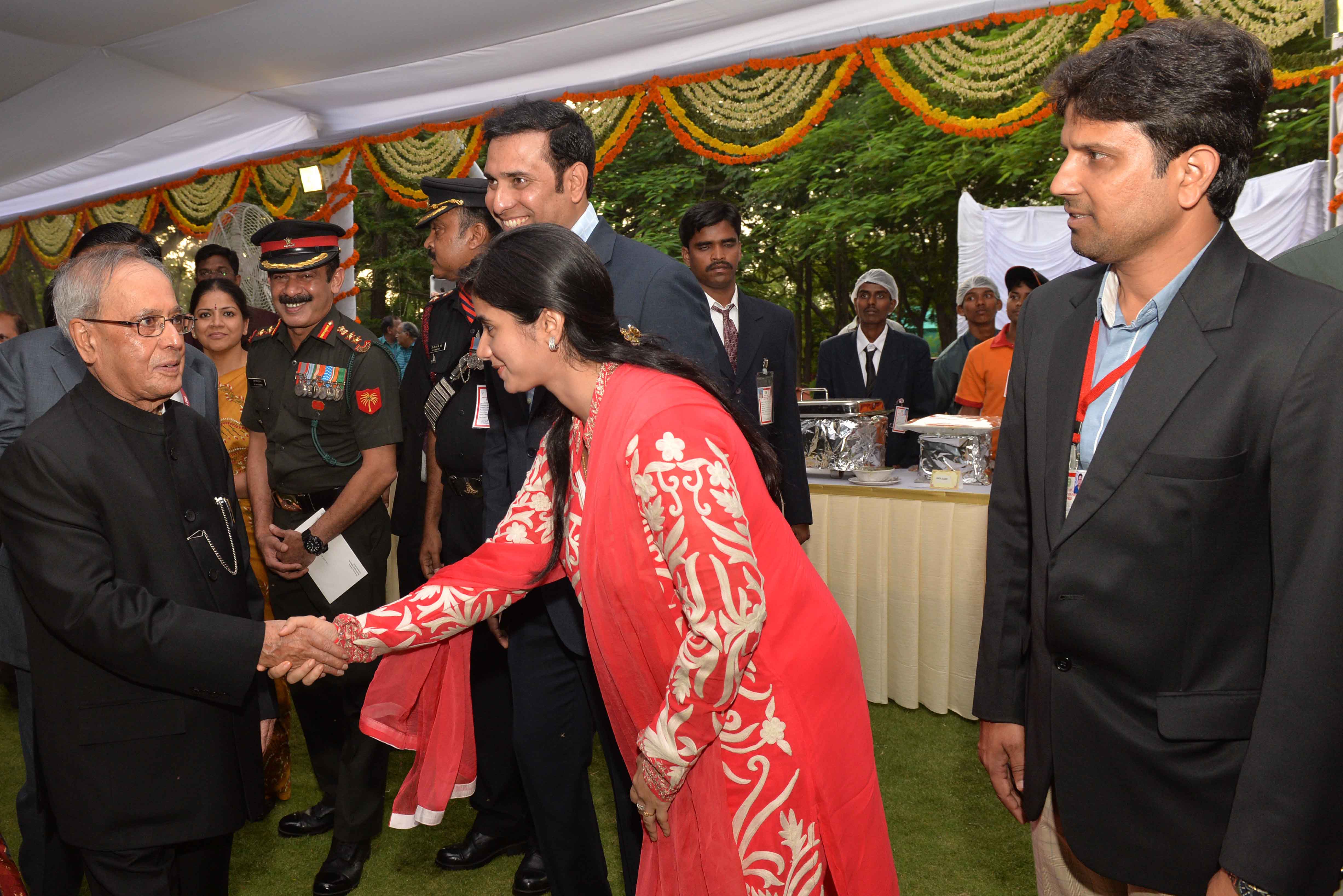 The President of India, Shri Pranab Mukherjee meeting dignitaries at the Reception hosted by him at Rashtrapati Nilayam, Bolarum in Telangana on July 7, 2015.