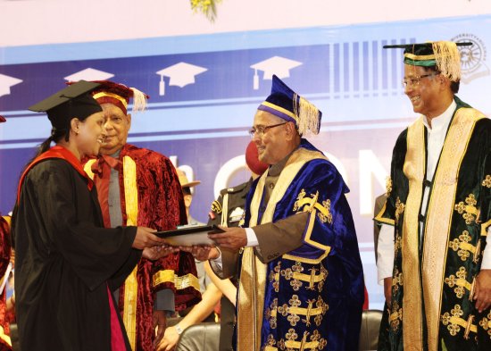 The President of India, Shri Pranab Mukherjee while presenting a degree to the student at the Convocation of Assam University at Silchar in Assam on May 14, 2013. The Governor of Assam, Shri Janaki Ballav Patnaik and Chief Minister of Assam, Shri Tarun Go