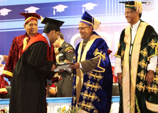 The President of India, Shri Pranab Mukherjee while presenting a degree to the student at the Convocation of Assam University at Silchar in Assam on May 14, 2013. The Governor of Assam, Shri Janaki Ballav Patnaik and Chief Minister of Assam, Shri Tarun Go