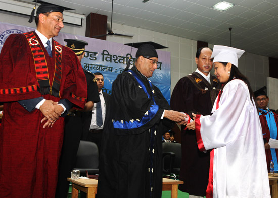 The President of India, Shri Pranab Mukherjee while presenting an award to PSD Degree holder at the Third Convocation of Nagaland University at Lumami in Nagaland on May 15, 2013. The Governor of Nagaland, Dr. Ashwani Kumar and the Chief Minister of Naga