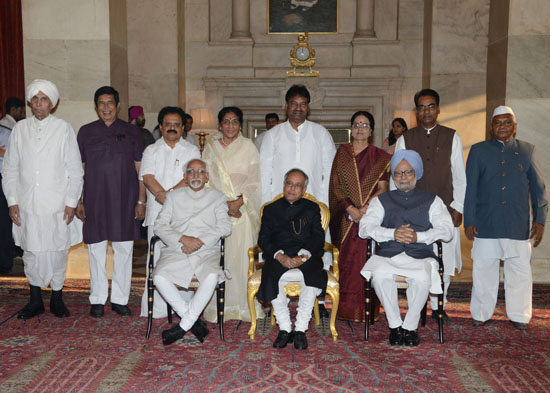 The President of India, Shri Pranab Mukherjee, the Vice President of India, Shri M. Hamid Ansari and the Prime Minister of India, Dr. Manmohan Singh with newly sworn-in Ministers at Rashtrapati Bhavan on June 17, 2013.