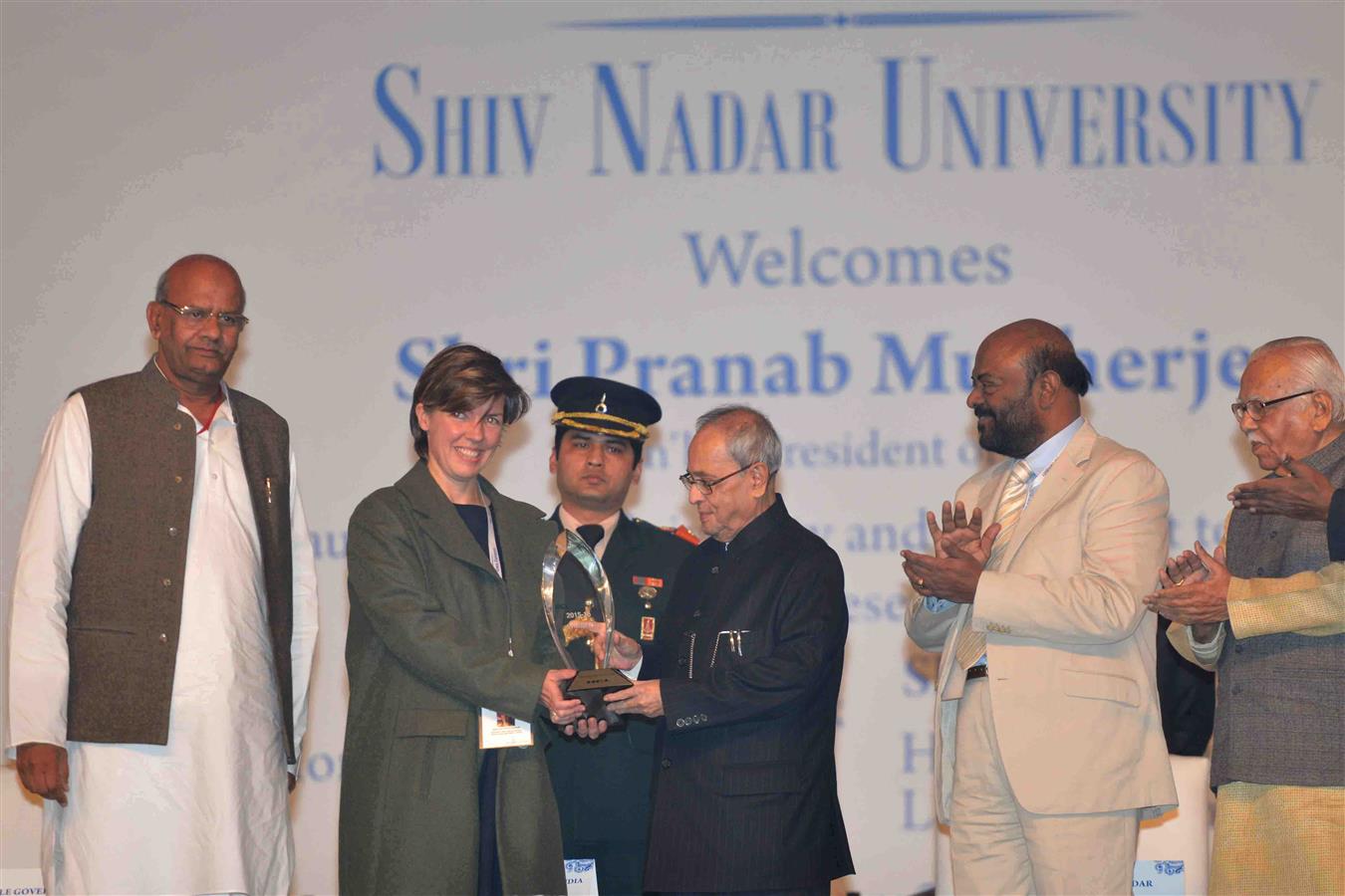 The President of India, Shri Pranab Mukherjee presenting the HCL Citizen's Grants Award during the inauguration of Shiv Nadar University at Dadri, Gautam Buddha Nagar in Uttar Pradesh on January 18, 2016. 