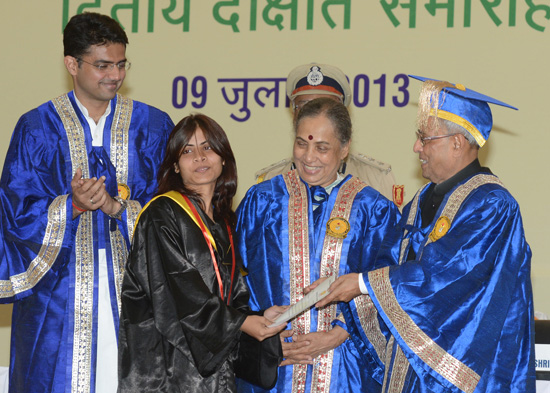 The President of India, Shri Pranab Mukherjee while presenting a degree to the student at the Second Convocation of the Central University of Rajasthan at Kishangarh in Rajasthan on July 9, 2013. Also seen are the Governor of Rajasthan, Smt. Margaret Alva