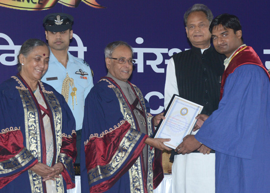 The President of India, Shri Pranab Mukherjee while presenting a degree to the student at the 8th Convocation of Malaviya National Institute of Technology at Jaipur in Rajasthan on July 9, 2013. Also seen are the Governor of Rajasthan, Smt. Margaret Alva