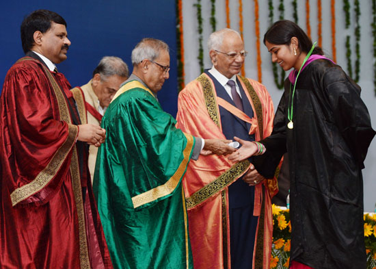 The President of India, Shri Pranab Mukherjee while presenting a degree to the student at the Annual Convocation of the University of Petroleum and Energy Studies (UPES) at Dehradun in Uttarakhand on August 26, 2013. Also seen are the Chancellor of UPES,