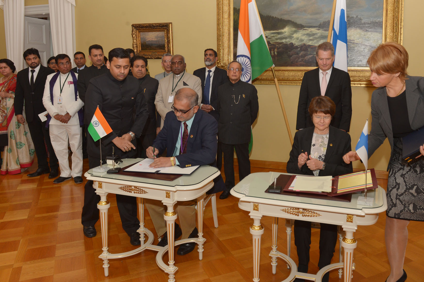 The President of India, Shri Pranab Mukherjee and the President of Finland, H.E. Mr. Sauli Niinisto witnessing signing of MOU on various subjects at Government House in Helsinki, Finland on October 15, 2014. 