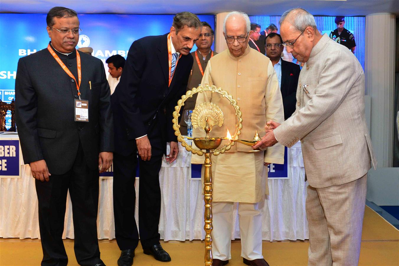 The President of India, Shri Pranab Mukherjee lighting the lamp to inaugurate a new office building of Bharat Chamber of Commerce at Kolkata in West Bengal on August 23, 2016. 