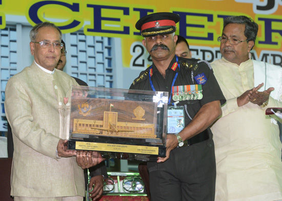 The President of India, Shri Pranab Mukherjee being felicitated at the inauguration of the Golden Jubilee celebrations of Sainik School at Bijapur in Karnataka on September 24, 2013. Also seen is the Chief Minister of Karnataka, Shri Siddaramaiah.