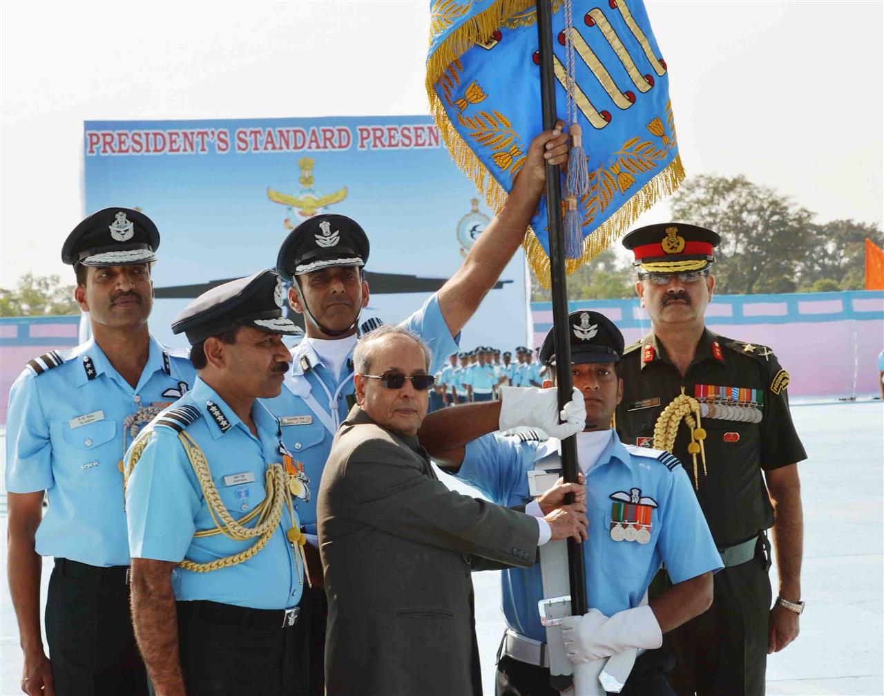 The President of India, Shri Pranab Mukherjee, presenting the Standard to 18 Sqn of Indian Air Force at Air Force Station, Hasimara, West Bengal on November 28, 2015.