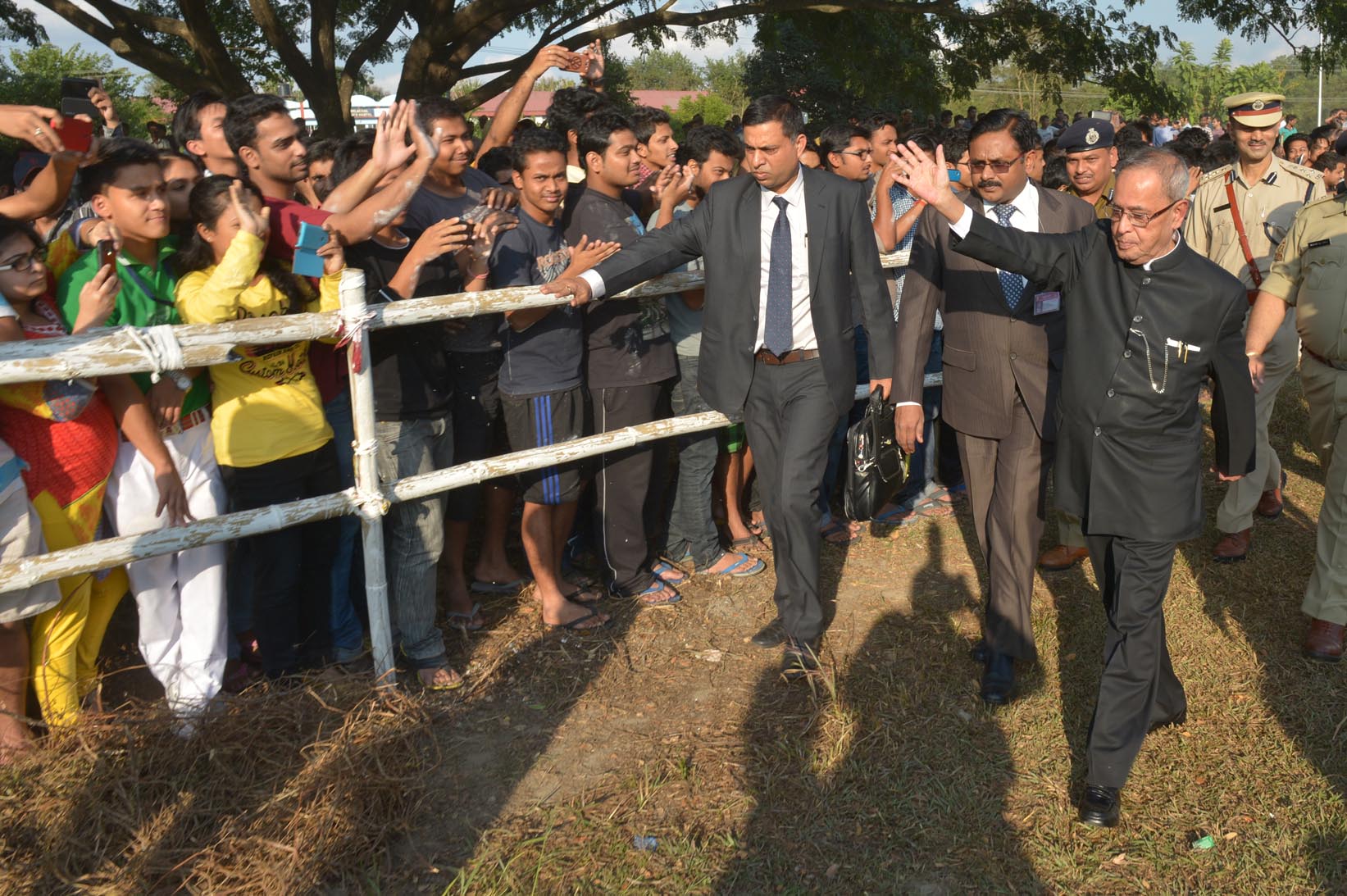 The President of India, Shri Pranab Mukherjee receiving greeting from people on his arrival at Tezpur University Helipad on November 20, 2014. 