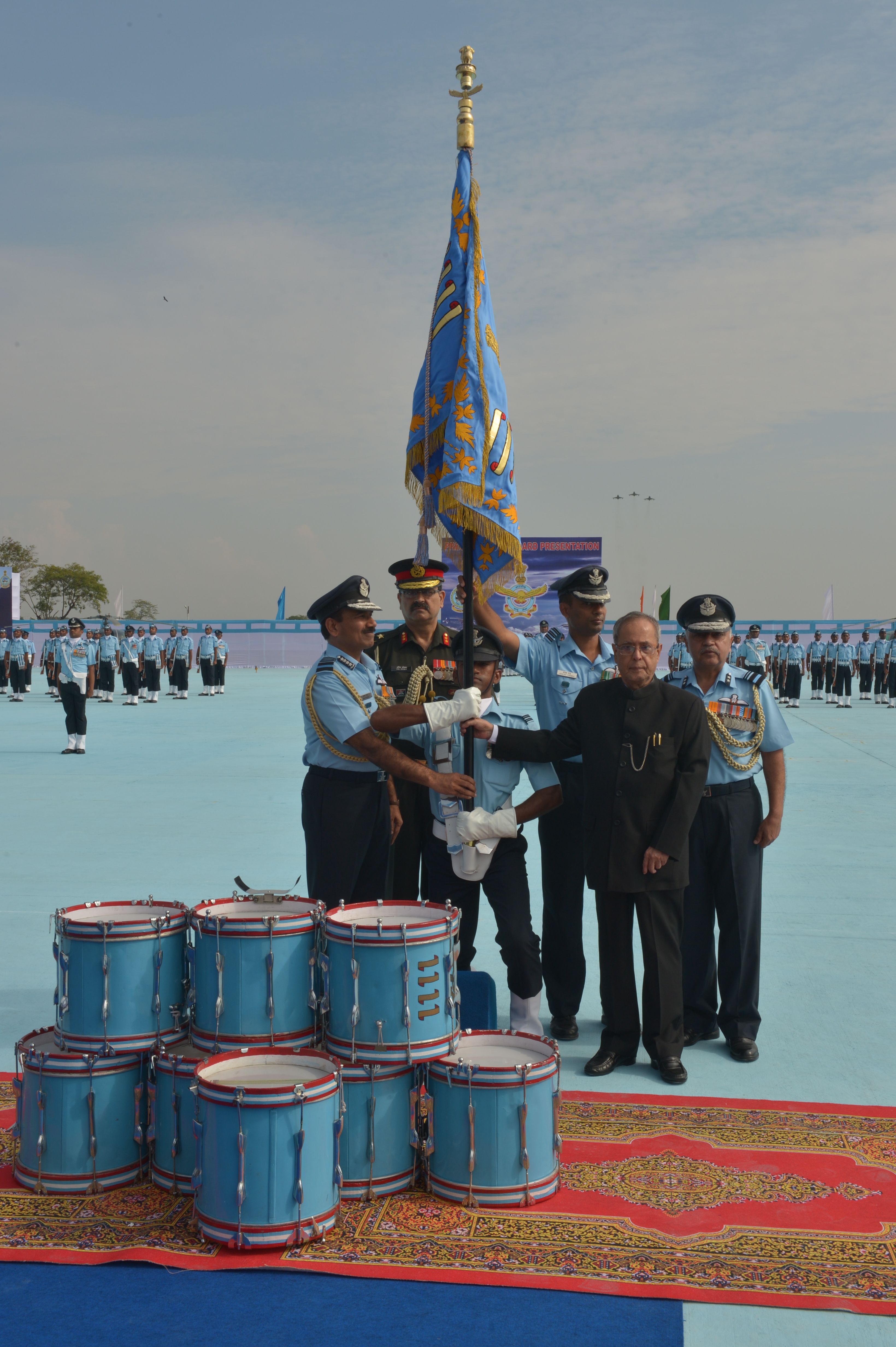 The President of India, Shri Pranab Mukherjee awarding Standards to 115 Helicopter Unit and 26 Squadron of Indian Air Force at Tezpur in Assam on November 21, 2014. 