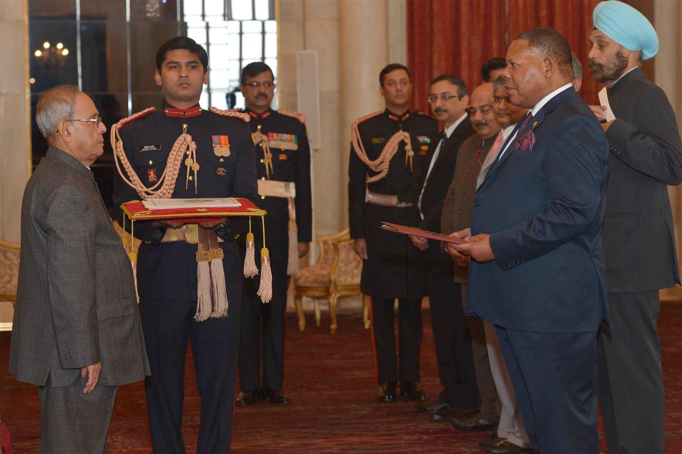 The High Commissioner of the Republic of Malawi, H.E. Dr. Mbuya Isaac Munlo presenting his credential to the President of India Shri Pranab Mukherjee at Rashtrapati Bhavan on December 7, 2015.