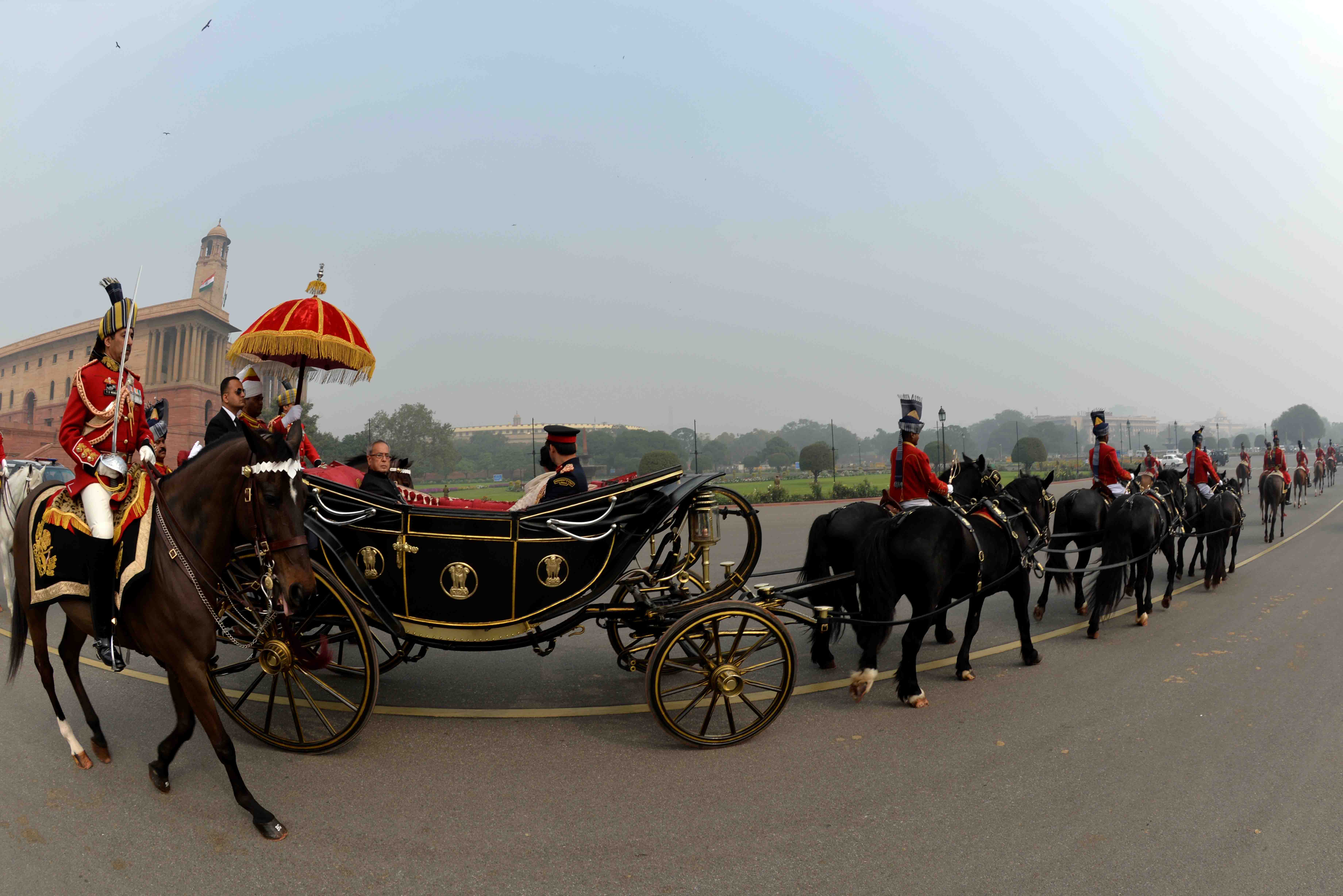 The President of India, Shri Pranab Mukherjee on the way to the Parliament House to address the members of both Houses of Parliament at Vijay Chowk on February 23, 2015.