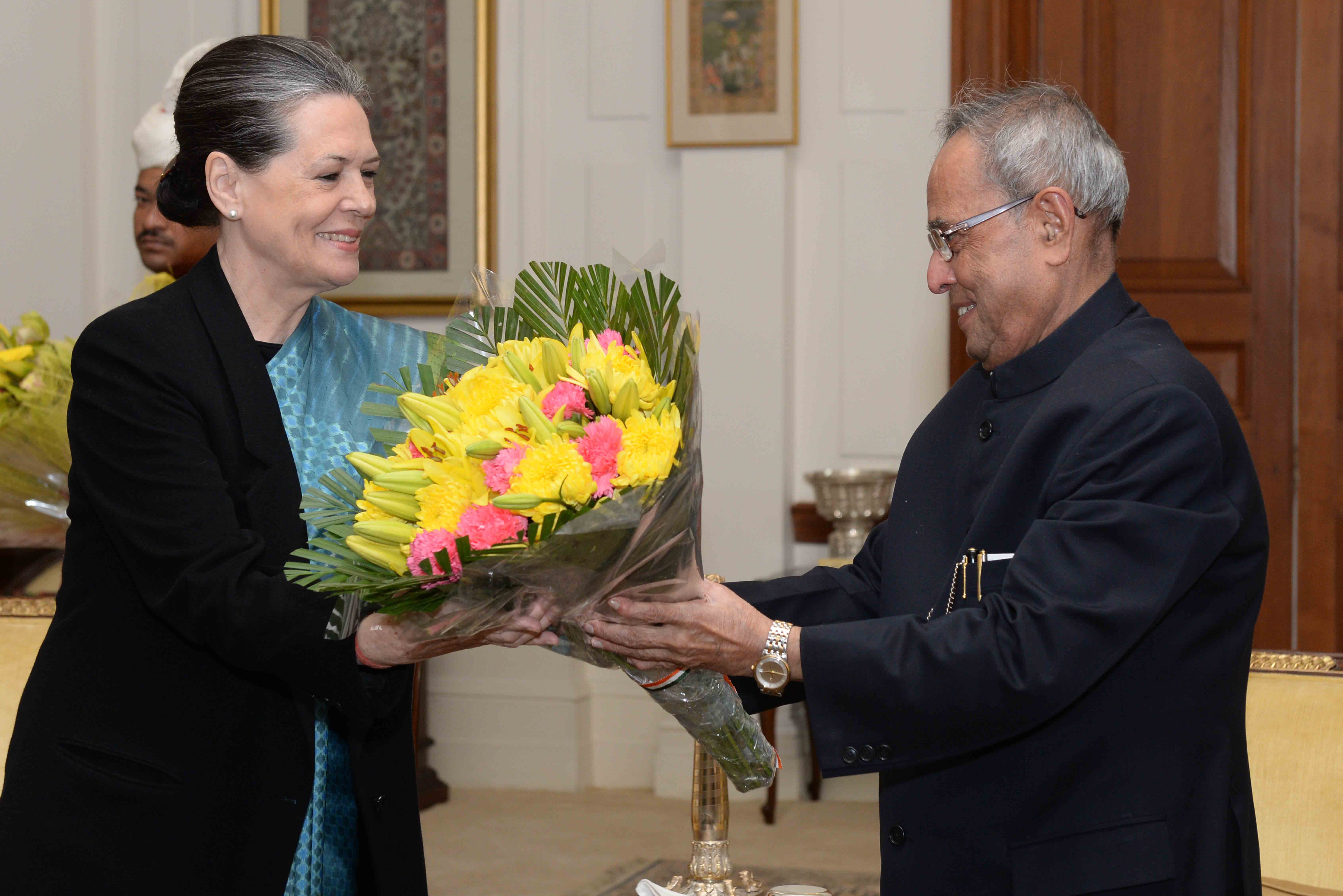 The President of India, Shri Pranab Mukherjee being greeted at Rashtrapati Bhavan on December 11, 2014 by the Chairperson of UPA, Smt. Sonia Gandhi on the occasion of his birthday. 