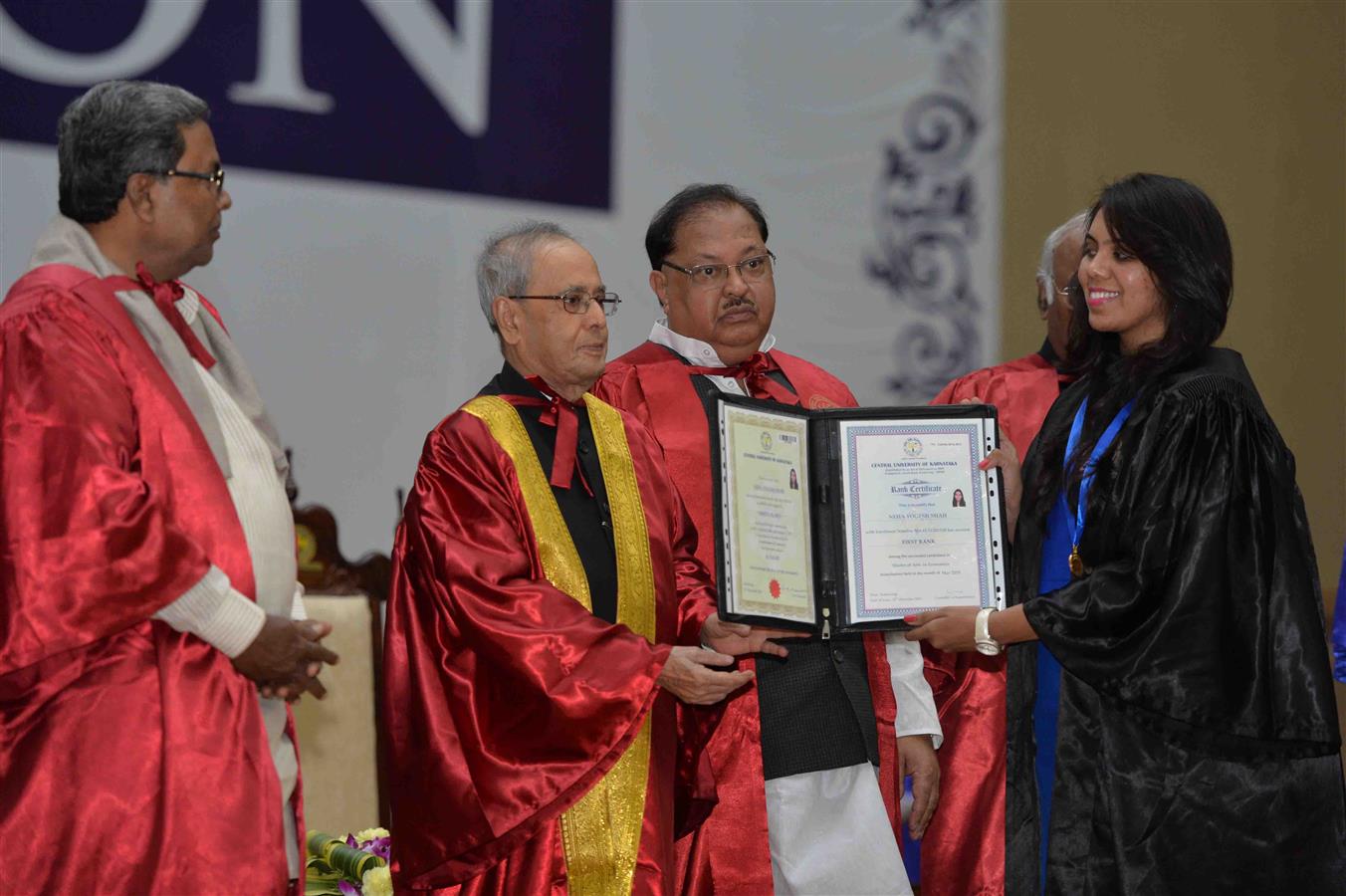 The President of India, Shri Pranab Mukherjee presenting the degree certificate to a Student at the 2nd Convocation of Central University of Karnataka at Kalaburagi in Karnataka on December 22, 2015.