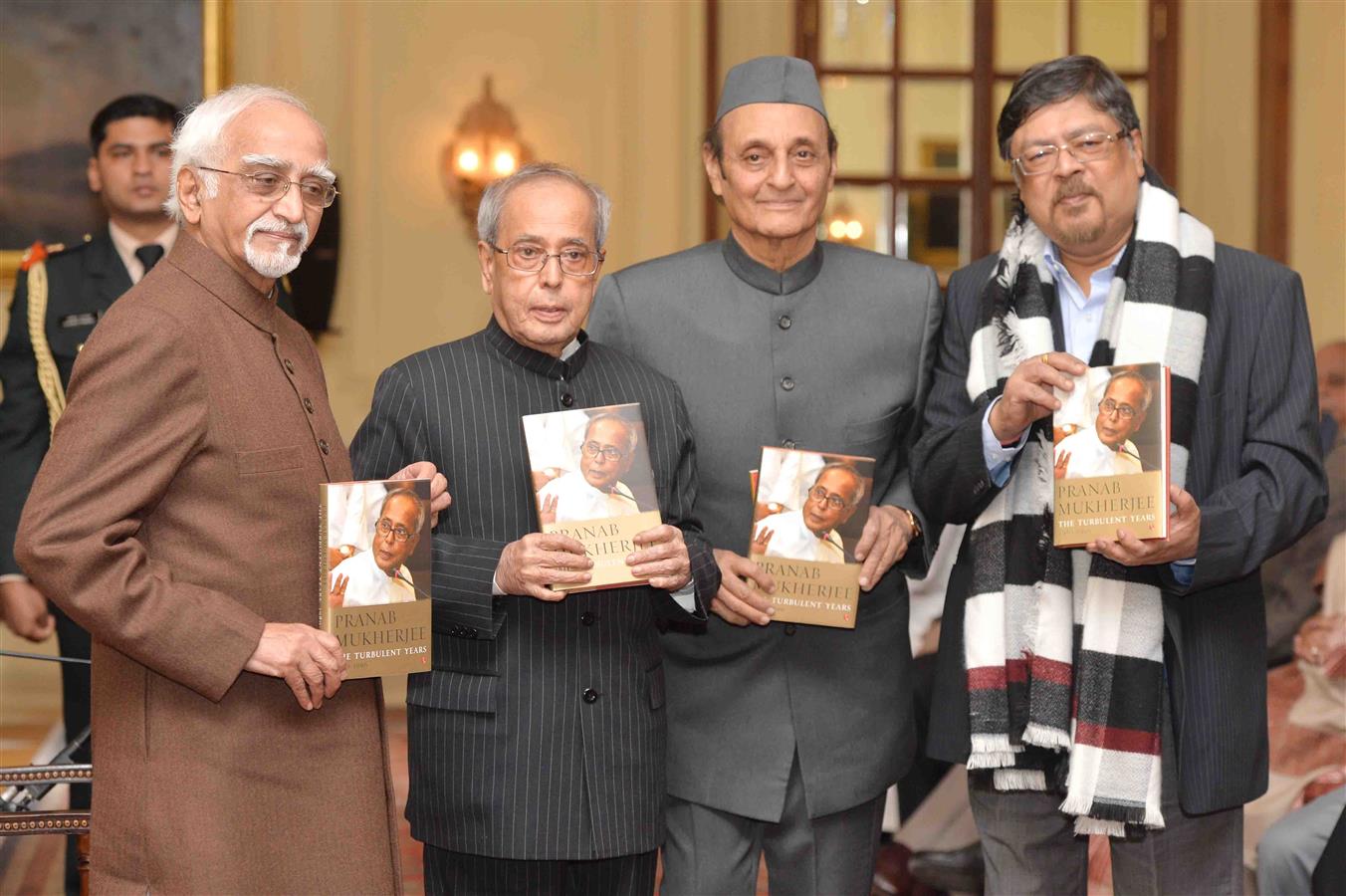 The Vice President of India, Shri Mohd. Hamid Ansari releasing the book “Pranab Mukherjee”, The Turbulent Years, 1980-1996 and presenting first copy to the President of India, Shri Pranab Mukherjee at Rashtrapati Bhavan on January 28, 2016. 