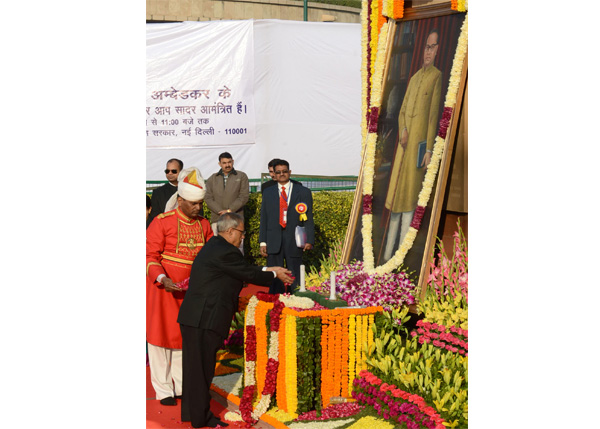 The President of India, Shri Pranab Mukherjee offering floral tributes at the statue of Baba Saheb Dr. B.R. Ambedkar at the Parliament House Lawns in New Delhi on December 6, 2013 on the occasion of his 'Mahaparinirvan Diwas'.