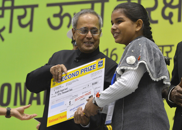 The President of India, Shri Pranab Mukherjee while presenting a National Energy Conservation Award at Vigyan Bhavan, New Delhi December 16, 2013 on the occasion of the National Energy Conservation Day.