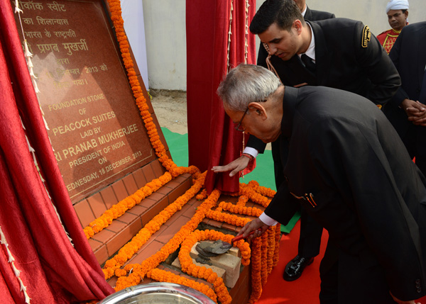 The President of India, Shri Pranab Mukherjee laying the foundation stone of Peacok Suites at Schedule-A, Near Swimming pool in New Delhi on December 18, 2013.