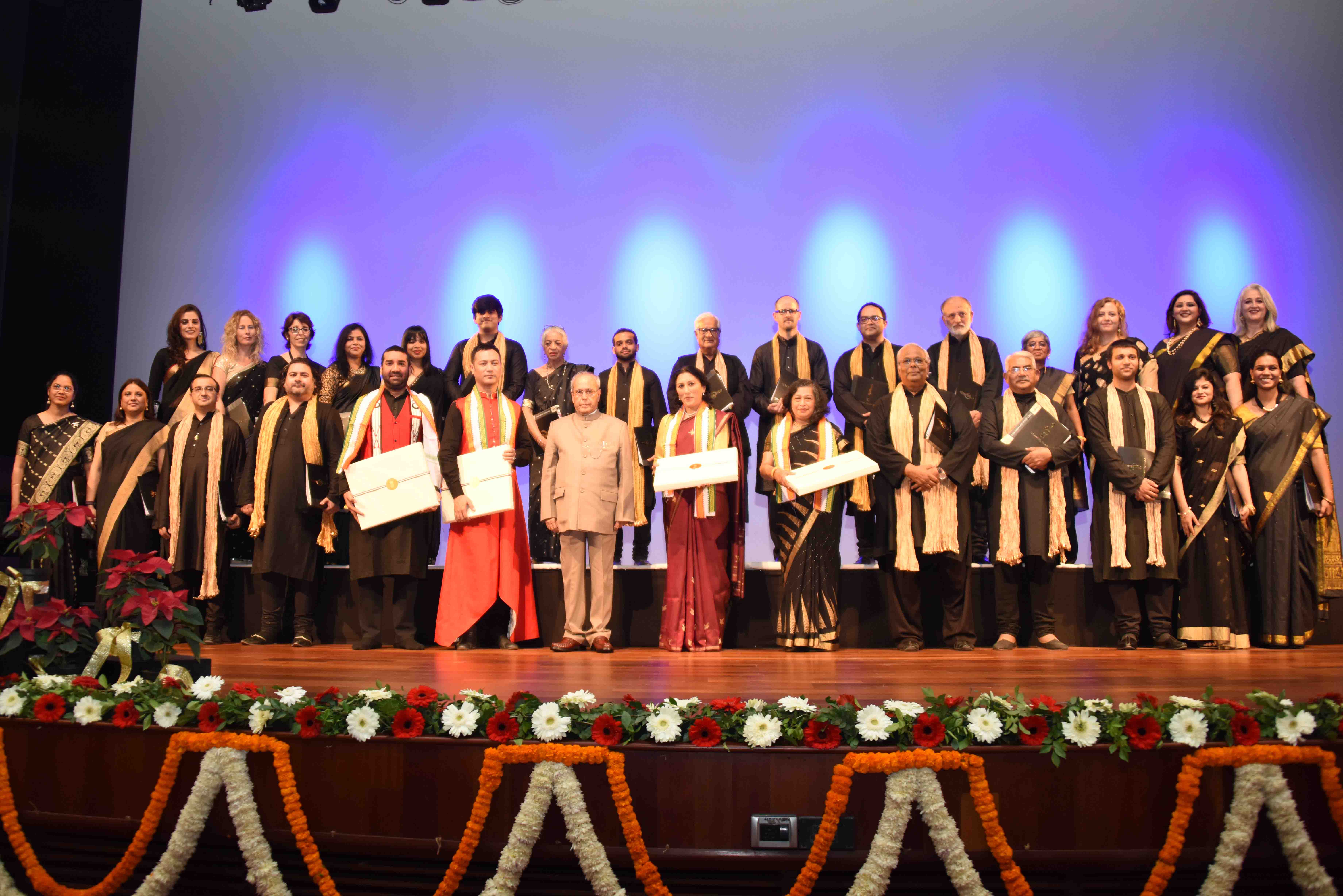 The President of India, Shri Pranab Mukherjee with artists after witnessing the Christmas Carols by Capital City Minstrels at Rashtrapati Bhavan Auditorium on December 18, 2016. 